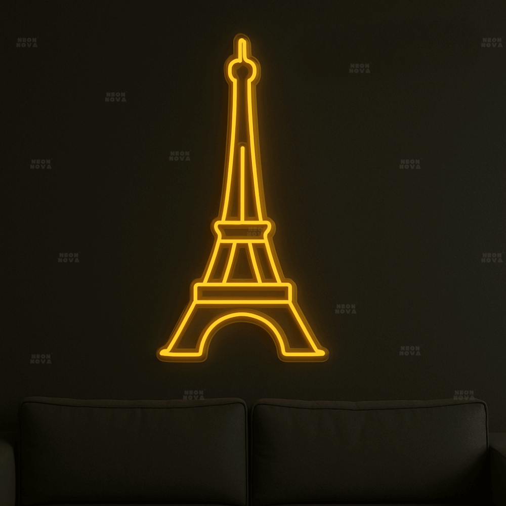 LED Neonschild Eiffelturm in Goldgelb an schwarzer Wand montiert